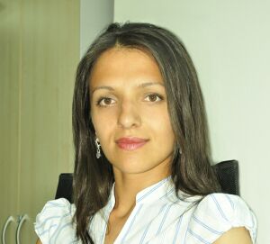 Irina Iliescu, Senior Industrial Negotiator în cadrul companiei de consultanţă imobiliară "King Sturge"